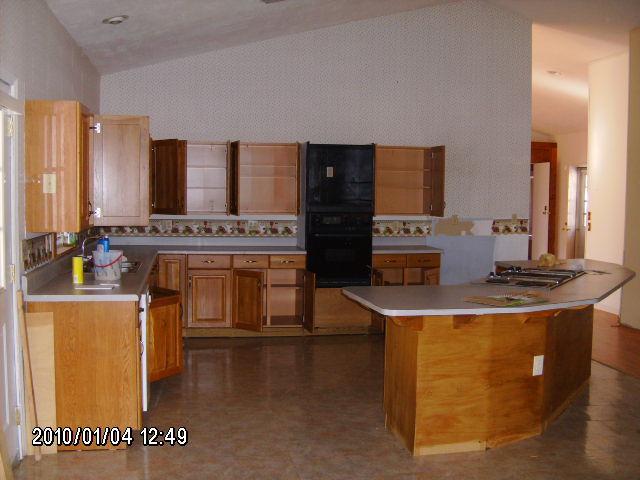 1410 Eton Road Hardy, VA 24101 - Photo 2 of 5 a kitchen with a stove top oven