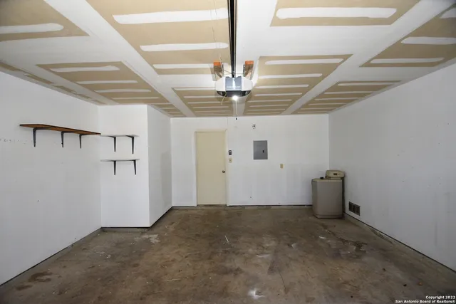 a view of balcony with wooden floor and seating space