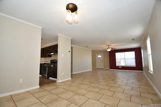 a view of a room with a barbeque and fireplace