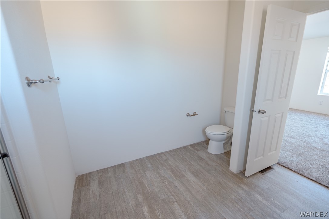 5746 Eden Road Golden Valley, AZ 86413 - Photo 16 of 27 a view of a bathroom with a sink