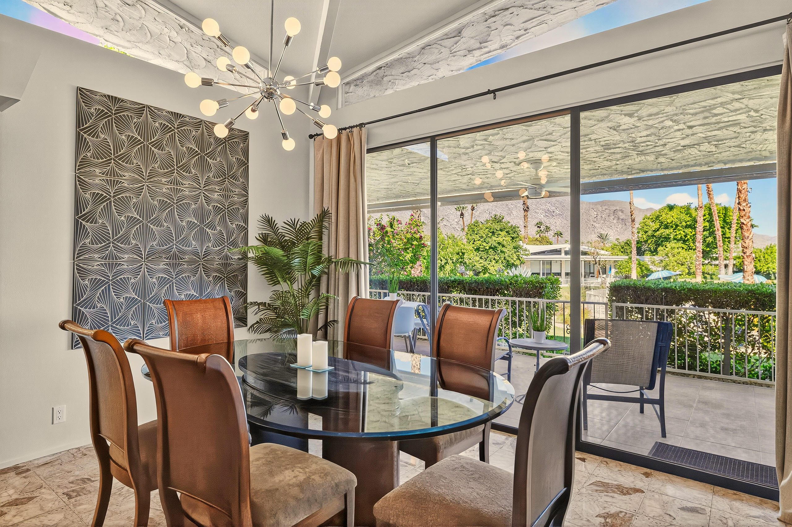 1570 South La Verne Way Palm Springs, CA 92264 - Photo 11 of 27 a view of a dining room with furniture window and outside view