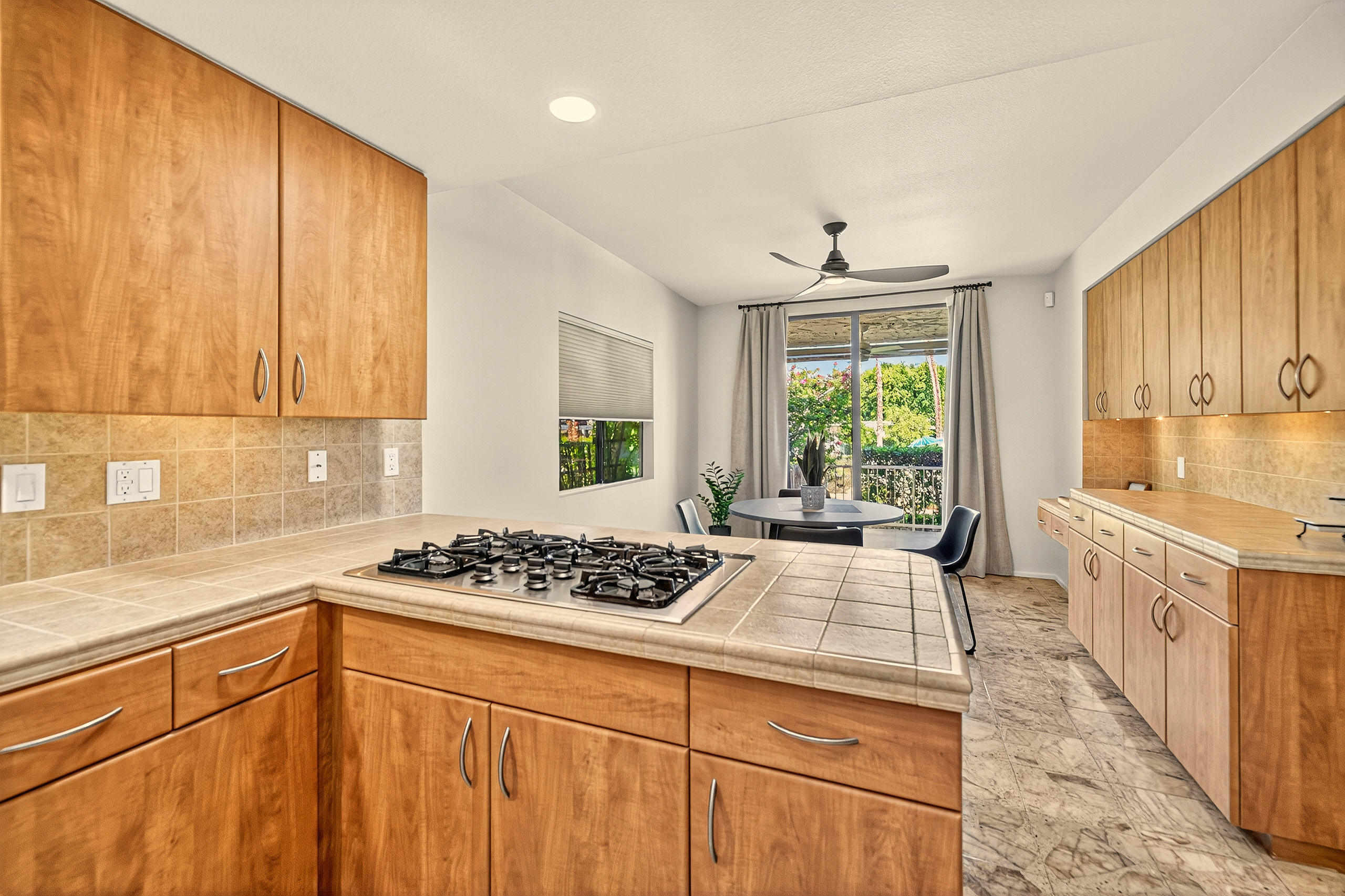 1570 South La Verne Way Palm Springs, CA 92264 - Photo 13 of 27 a kitchen with stainless steel appliances a stove a sink and a window