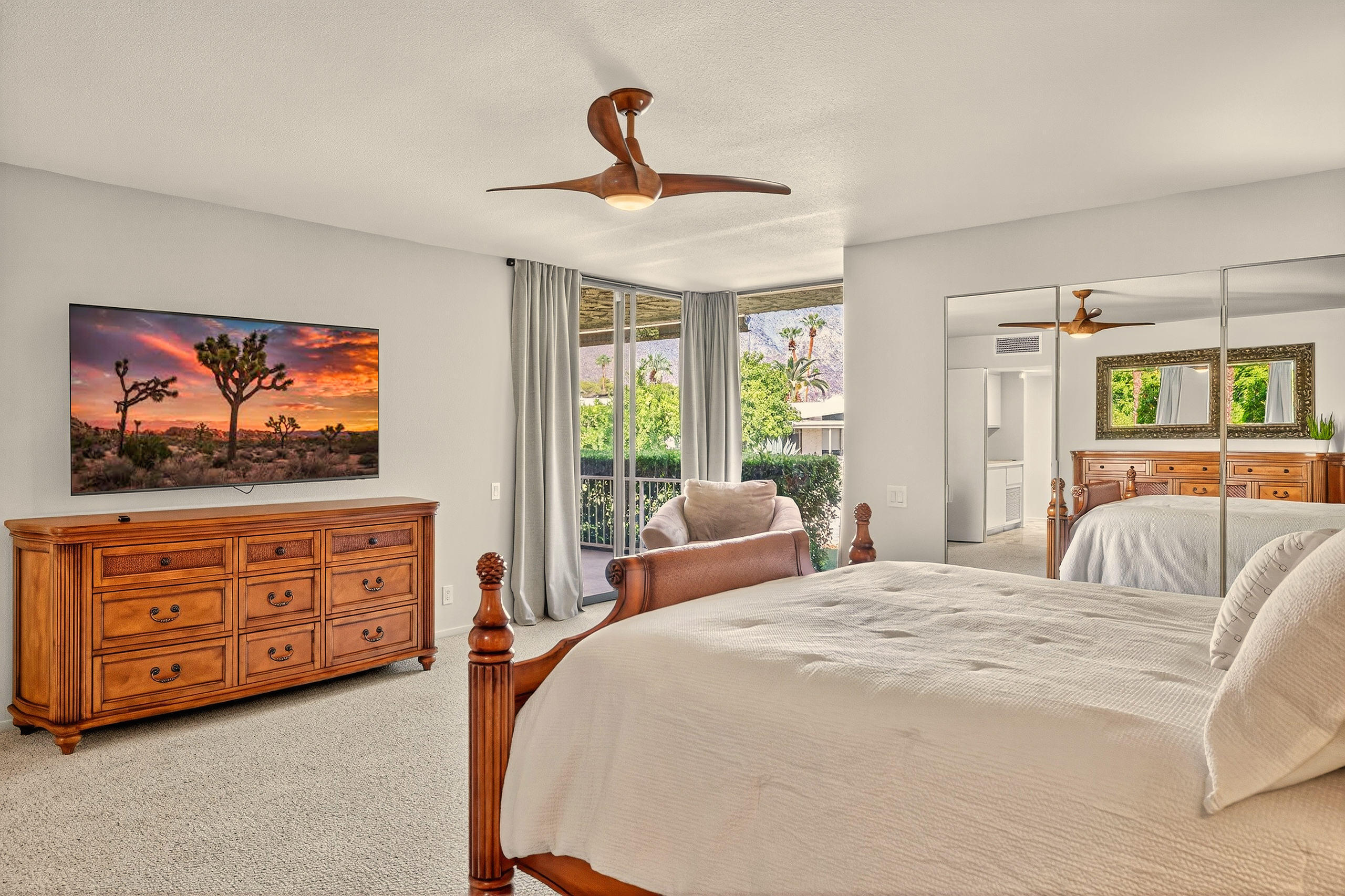 1570 South La Verne Way Palm Springs, CA 92264 - Photo 14 of 27 a bedroom with a bed and wooden floor