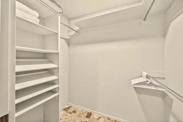a bathroom with a sink and a shower
