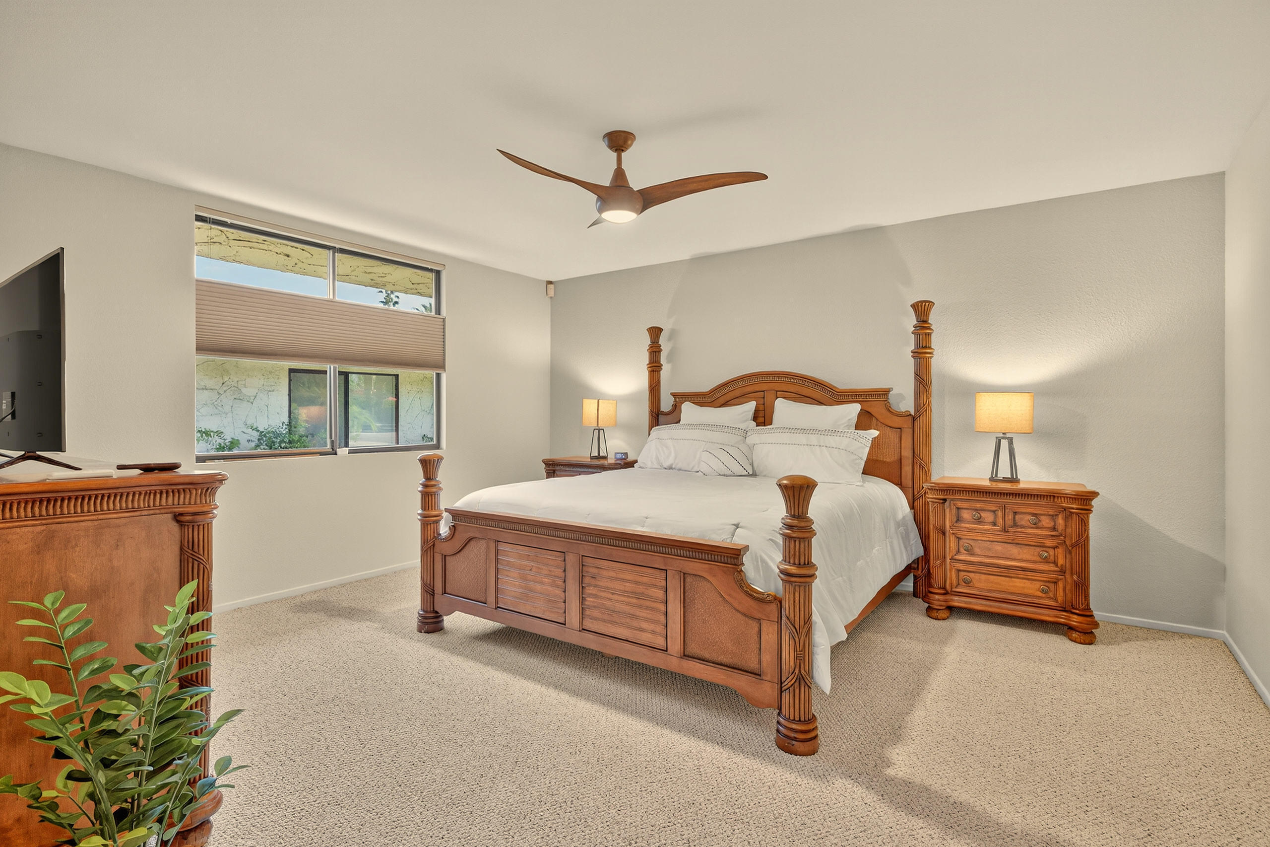 1570 South La Verne Way Palm Springs, CA 92264 - Photo 19 of 27 a bedroom with a large bed and a window