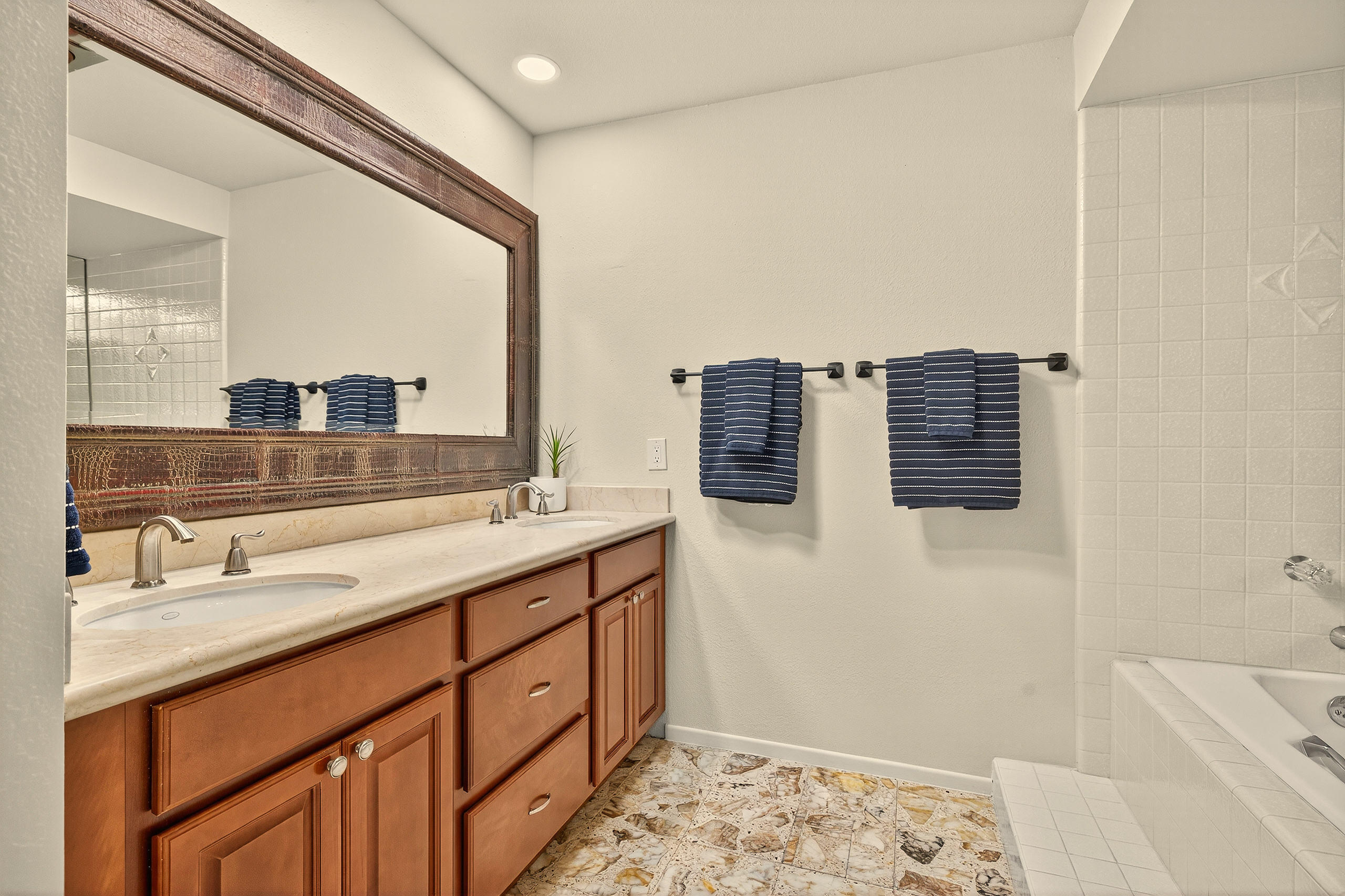 1570 South La Verne Way Palm Springs, CA 92264 - Photo 21 of 27 a bathroom with a sink and a mirror