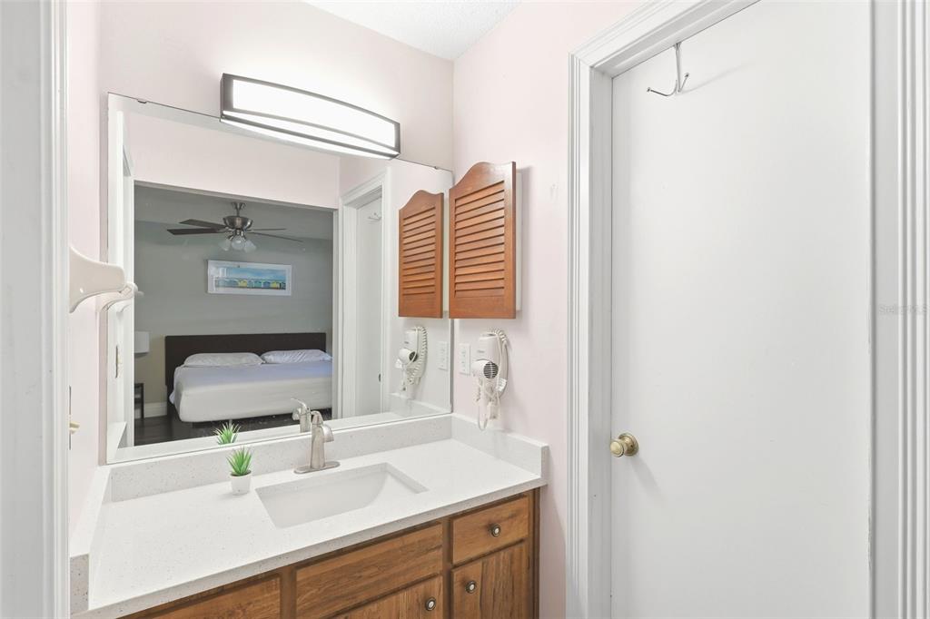 244 Angeles Road DeBary, FL 32713 - Photo 25 of 41 a bathroom with a sink and a mirror