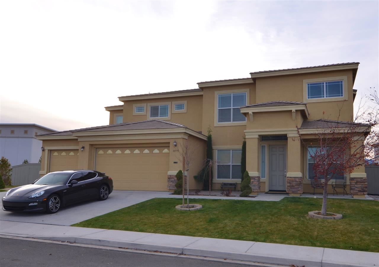 10595 Hampton Creek Drive Reno, NV 89521 - Photo 1 of 1 a view of a car parked in front of a house