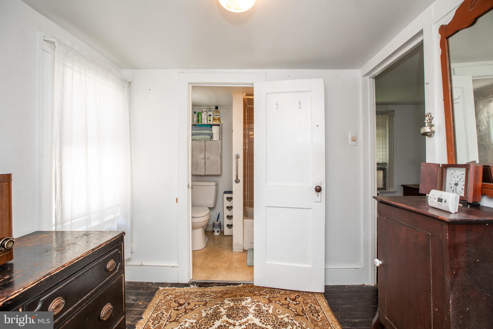 752 Groveville Road Hamilton, NJ 08620 - Photo 25 of 33 a bedroom with a bed and a dresser in it