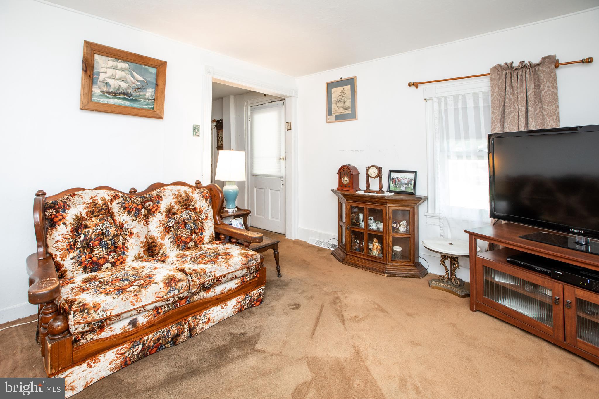 752 Groveville Road Hamilton, NJ 08620 - Photo 4 of 33 a bedroom with furniture and a flat screen tv