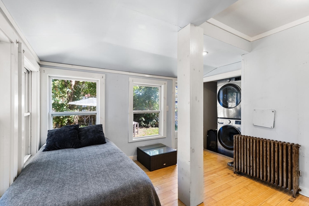 12 Harold Avenue Gloucester, MA 01930 - Photo 13 of 23 a bedroom with a bed and a large window