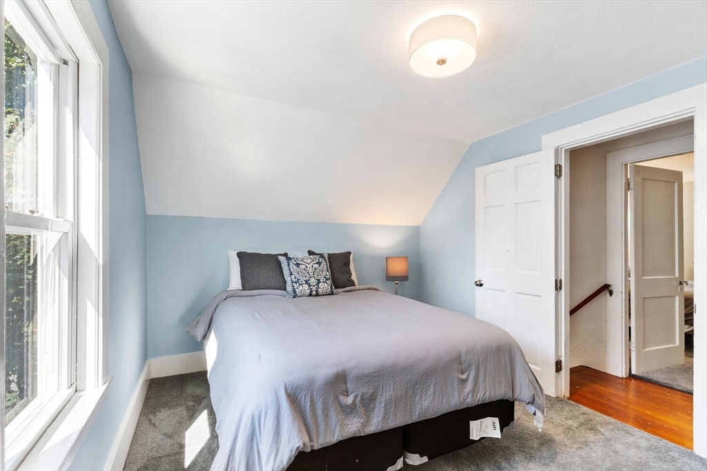 12 Harold Avenue Gloucester, MA 01930 - Photo 18 of 23 a bedroom with a bed and a window