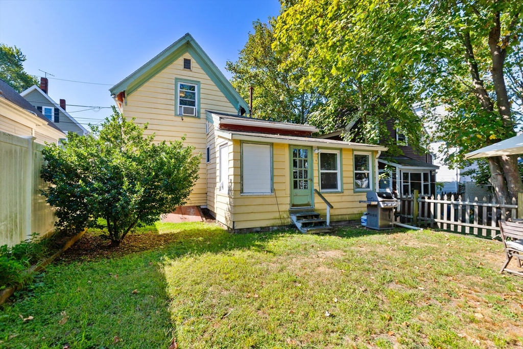 12 Harold Avenue Gloucester, MA 01930 - Photo 22 of 23 a view of a house with backyard sitting area and garden