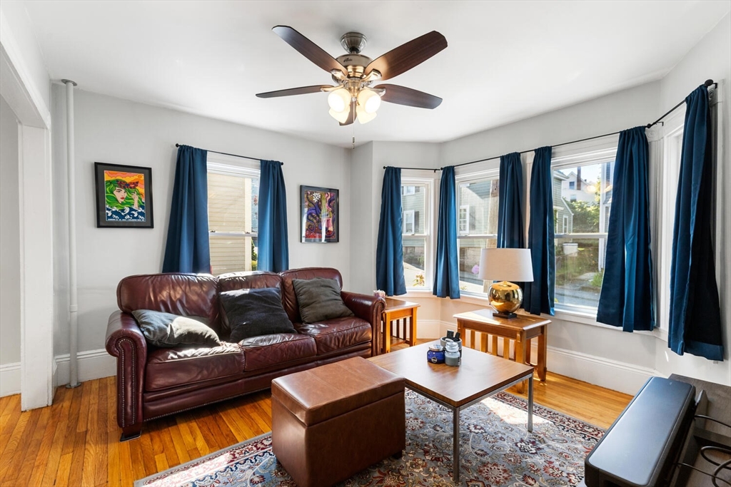 12 Harold Avenue Gloucester, MA 01930 - Photo 3 of 23 a living room with furniture and a large window
