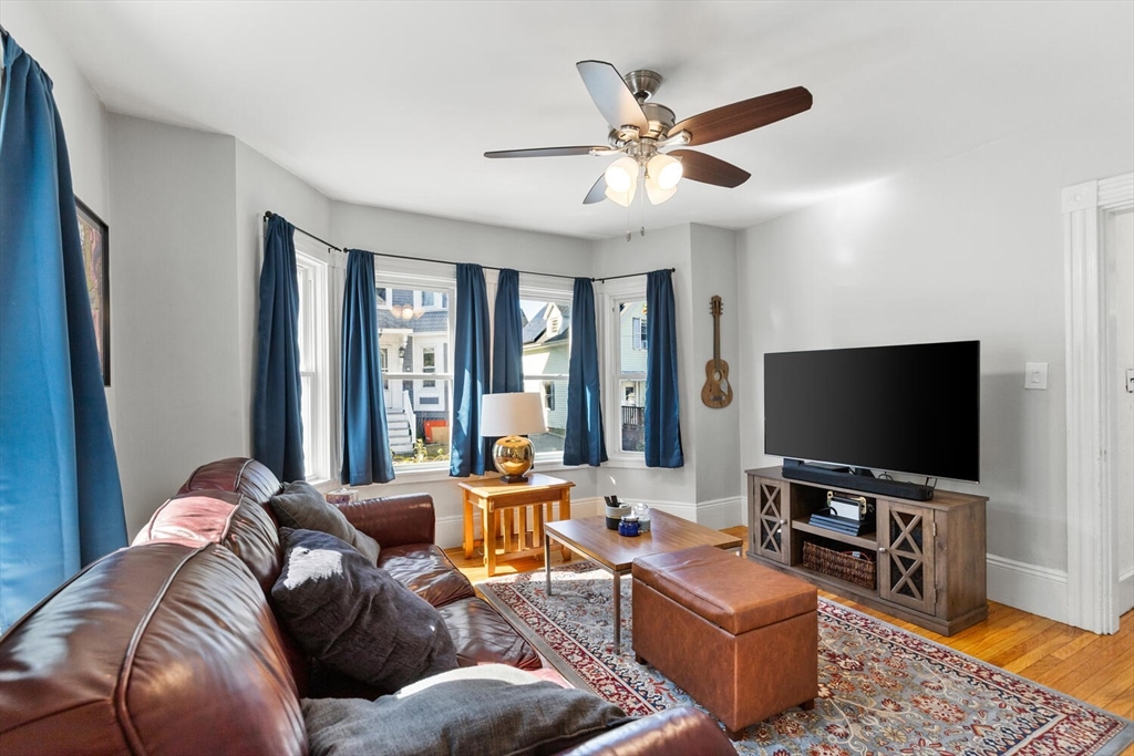 12 Harold Avenue Gloucester, MA 01930 - Photo 4 of 23 a living room with furniture and a flat screen tv