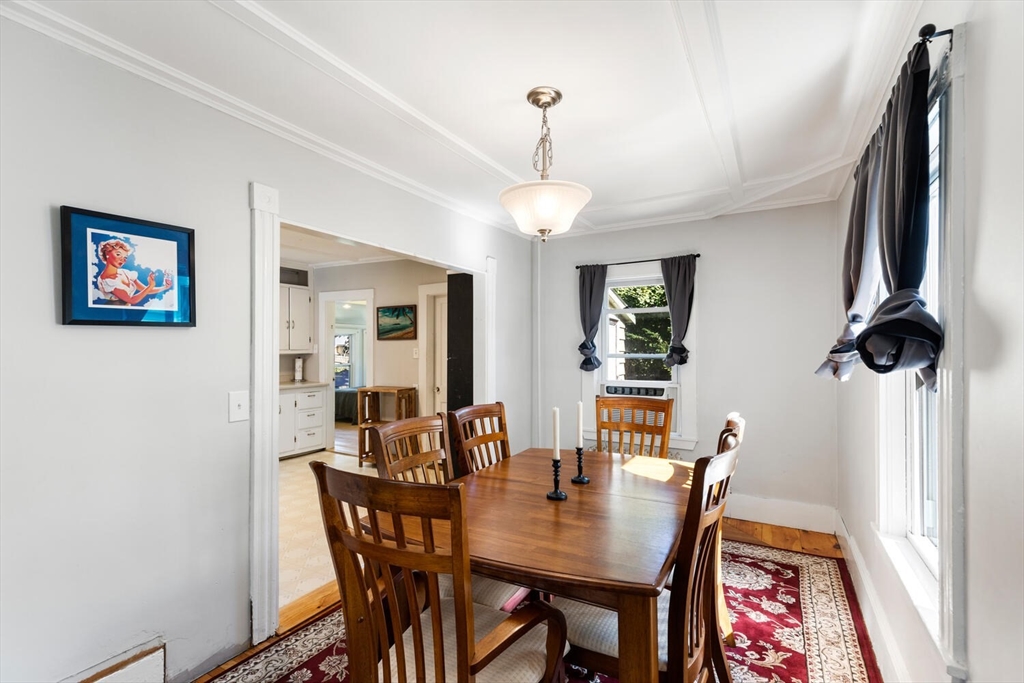 12 Harold Avenue Gloucester, MA 01930 - Photo 7 of 23 a view of a dining room with furniture and wooden floor
