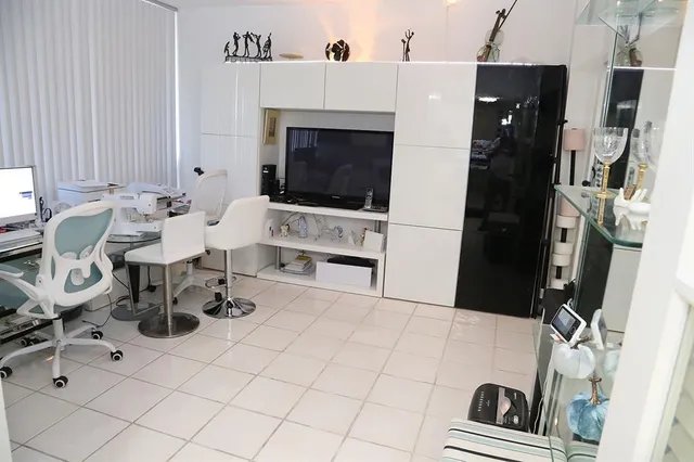 a bathroom with a sink a mirror a toilet and a shower