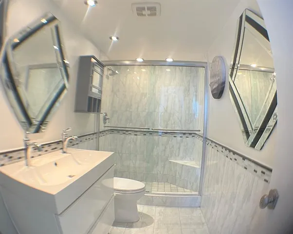 a view of a livingroom with furniture and entryway