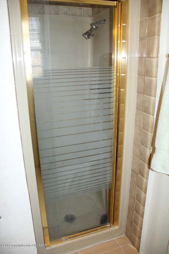 5324 Allen Street Amarillo, TX 79110 - Photo 12 of 24 a bathroom with a shower