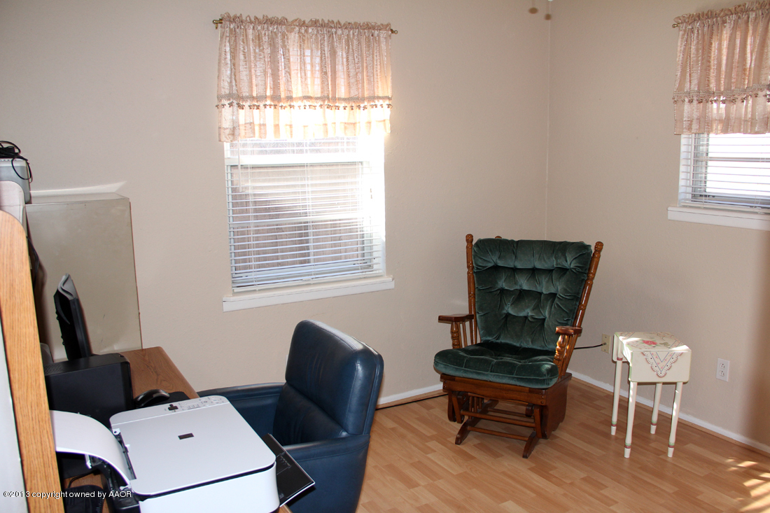5324 Allen Street Amarillo, TX 79110 - Photo 19 of 24 a living room with furniture and a window