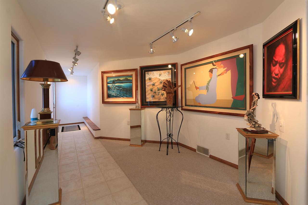 1415 Middle Road Kula, HI 96790 - Photo 12 of 30 a living room with furniture and a flat screen tv