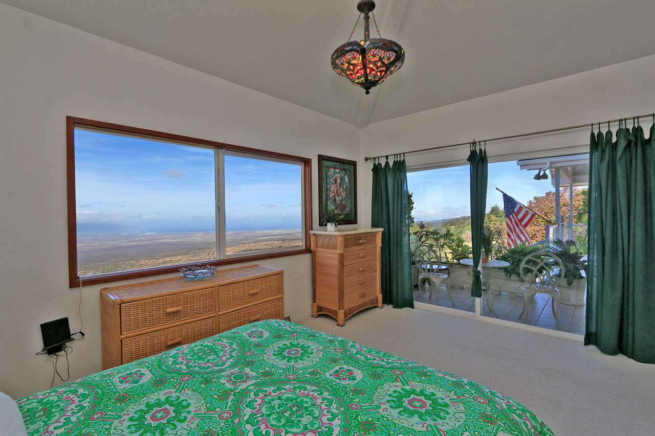 1415 Middle Road Kula, HI 96790 - Photo 17 of 30 a view of a livingroom with furniture window and front door