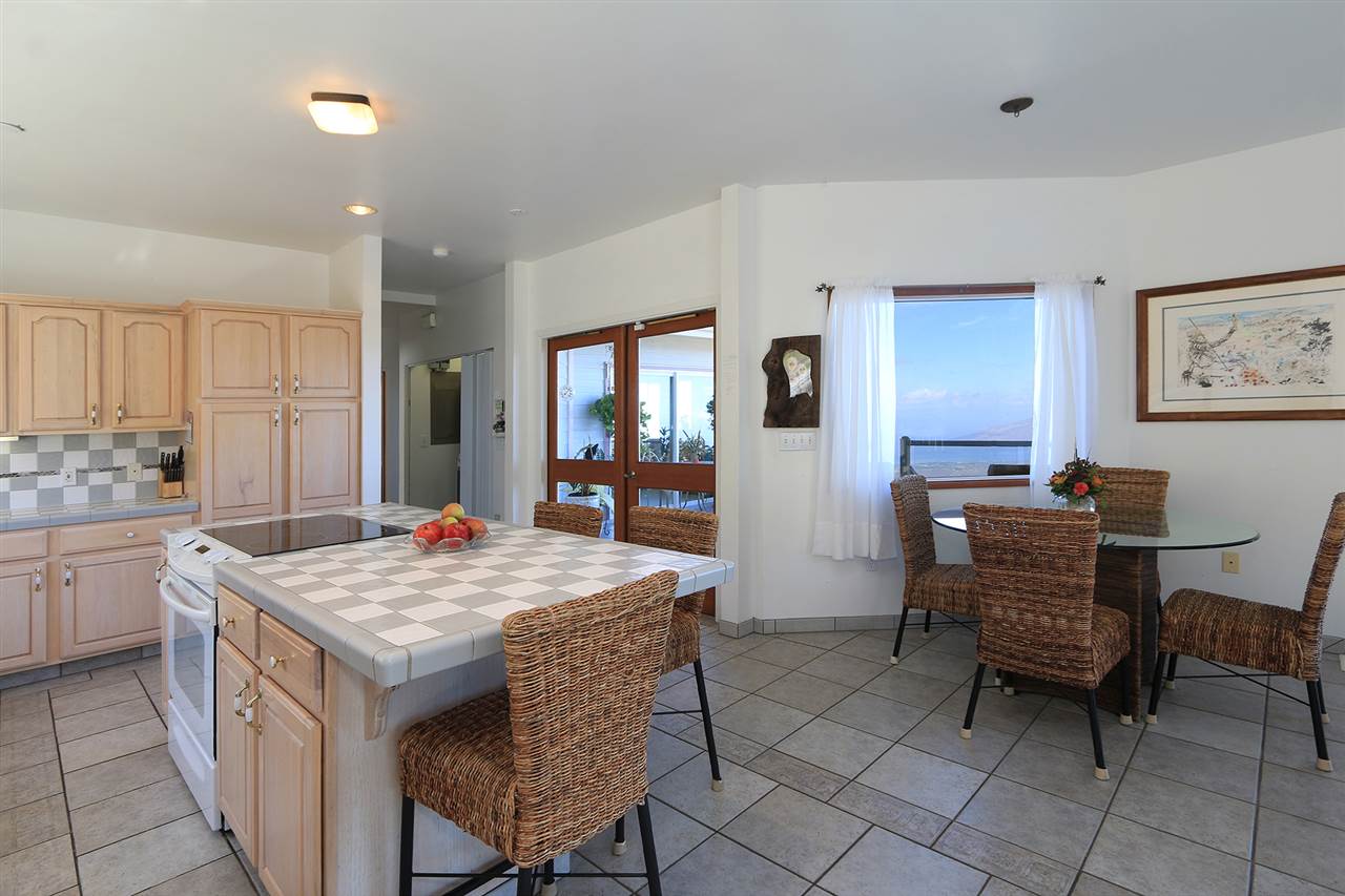 1415 Middle Road Kula, HI 96790 - Photo 20 of 30 a view of kitchen island with granite countertop furniture