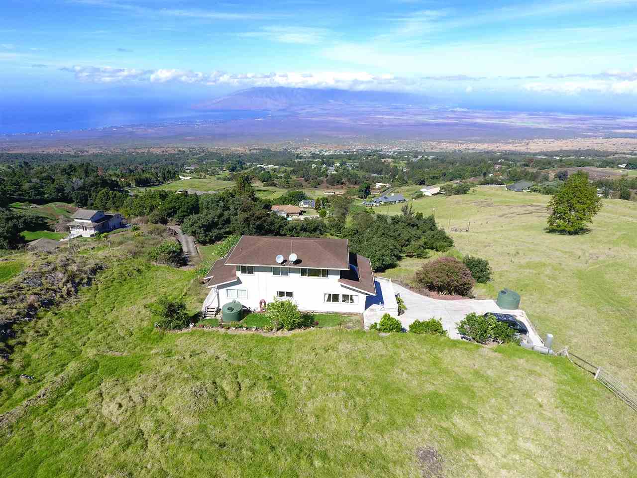 1415 Middle Road Kula, HI 96790 - Photo 27 of 30 a view of a lake with a car parked in the background