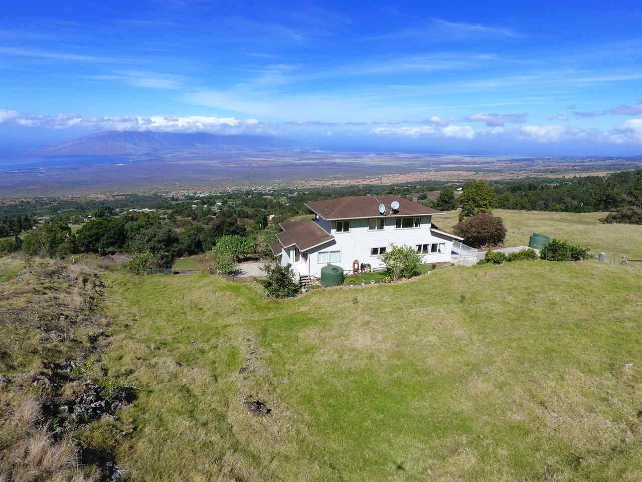 1415 Middle Road Kula, HI 96790 - Photo 29 of 30 a view of a big yard with swimming pool and mountain view