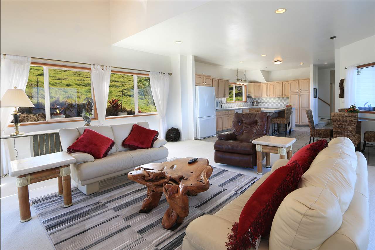 1415 Middle Road Kula, HI 96790 - Photo 5 of 30 a living room with furniture wooden floor and a large window