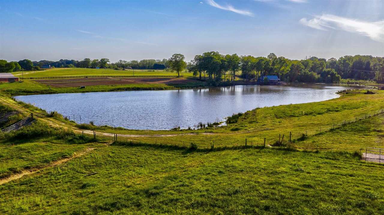 868 Joe Findley Road Royston, GA 30662 - Photo 1 of 1 a view of a lake with houses in the back