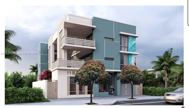 a front view of building with street sign