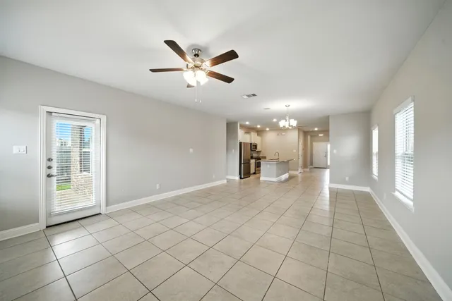 a view of an empty room and window