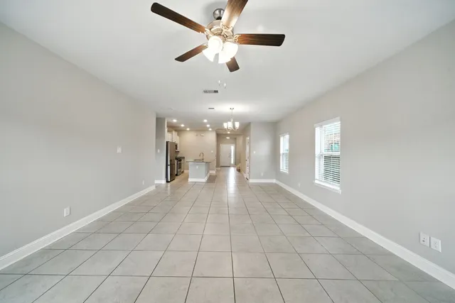a view of an empty room and window