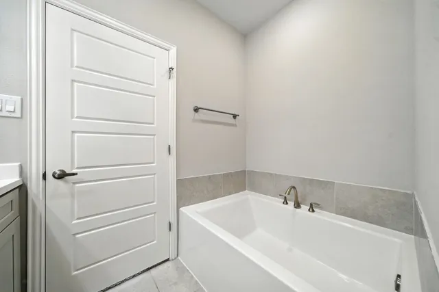 a bathroom with a bathtub