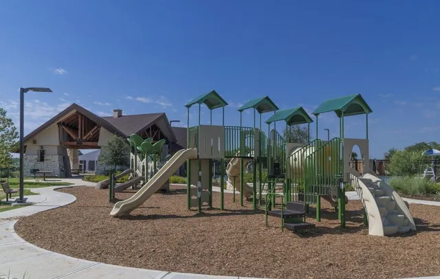 a view of a house with a park