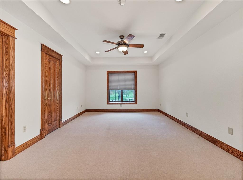 9290 Peebles Road Allison Park, PA 15101 - Photo 14 of 25 an empty room with windows and a ceiling fan