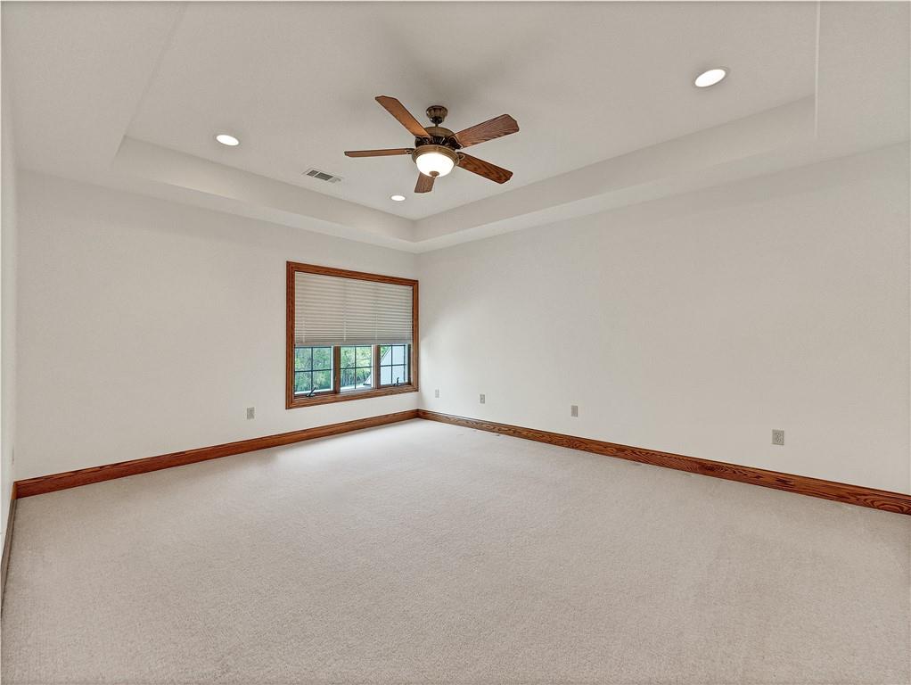 9290 Peebles Road Allison Park, PA 15101 - Photo 16 of 25 an empty room with windows and fan