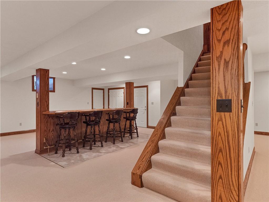 9290 Peebles Road Allison Park, PA 15101 - Photo 17 of 25 a dining room with furniture and stairs