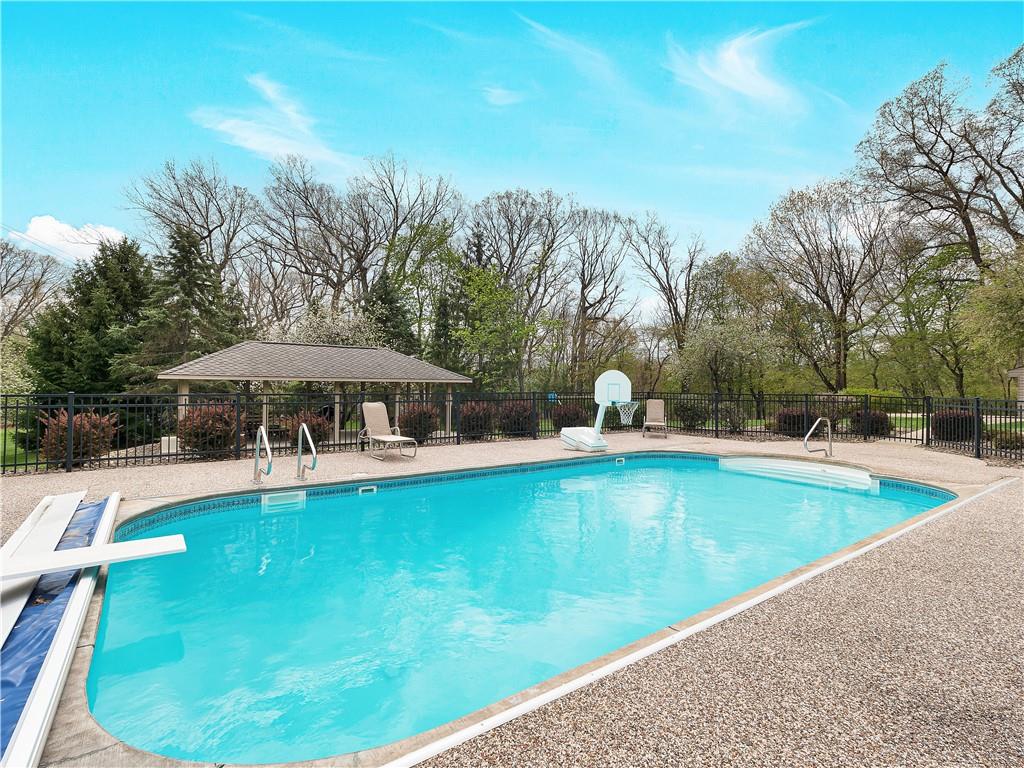 9290 Peebles Road Allison Park, PA 15101 - Photo 21 of 25 a view of a swimming pool with an outdoor seating and yard