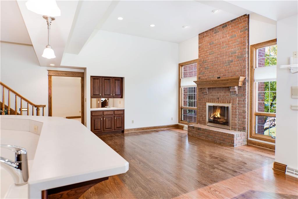 9290 Peebles Road Allison Park, PA 15101 - Photo 10 of 25 a view of a kitchen with furniture and a fireplace