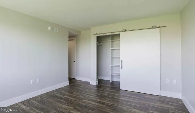a living room with furniture pool and flat screen tv