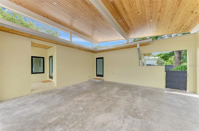 a view of front door of house and wooden floor