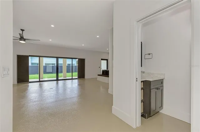 a view of an entryway with wooden floor