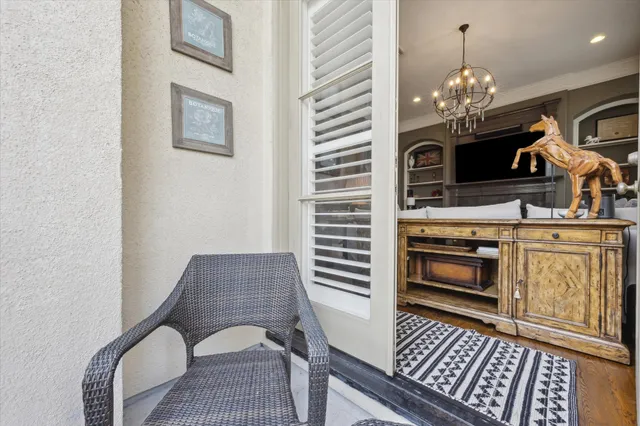 a view of a livingroom with furniture chandelier