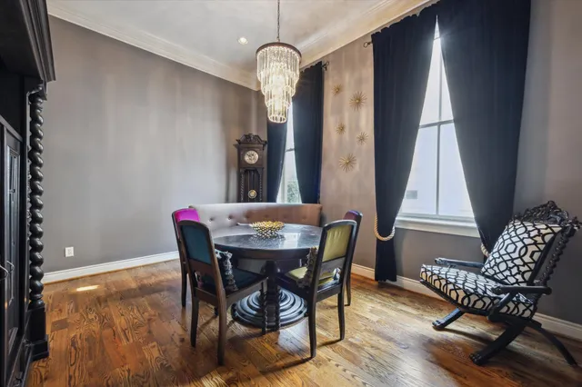 a view of a dining room with furniture and window