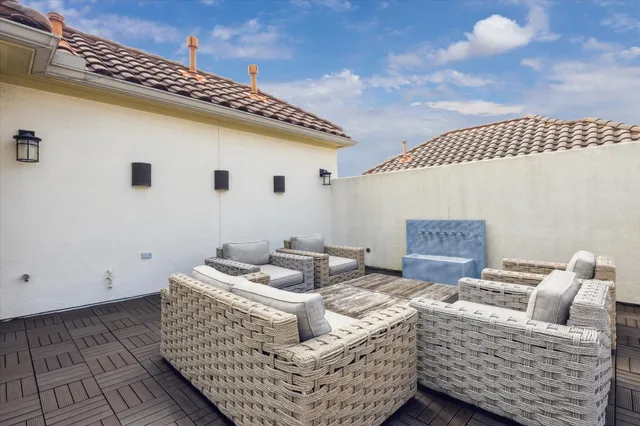 a view of a building with large tree