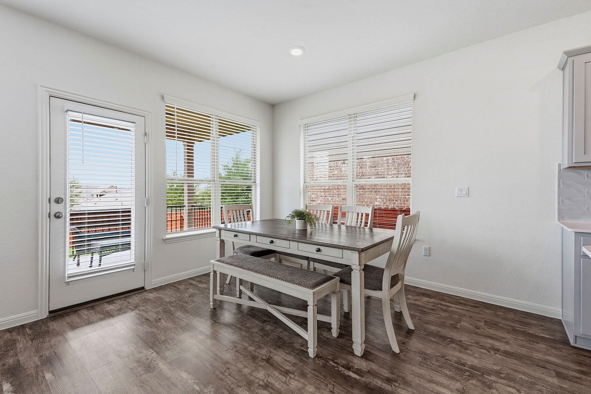 609 Allende Bend, Unit 130 Austin, TX 78748 - Photo 11 of 33 a dining room with furniture and window
