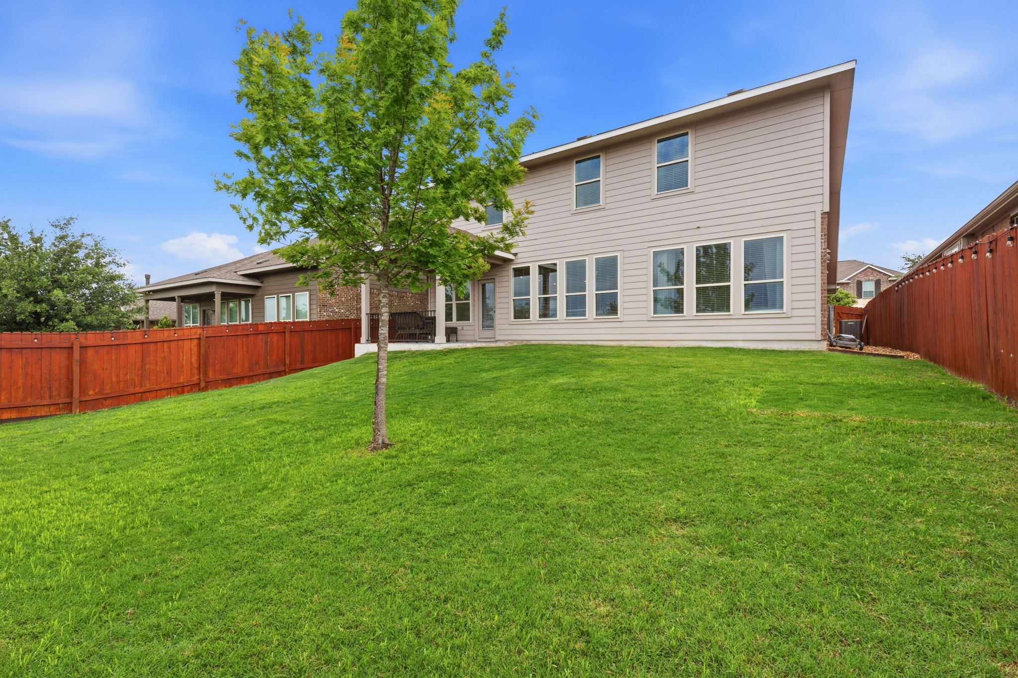 609 Allende Bend, Unit 130 Austin, TX 78748 - Photo 15 of 33 a house view with a garden space