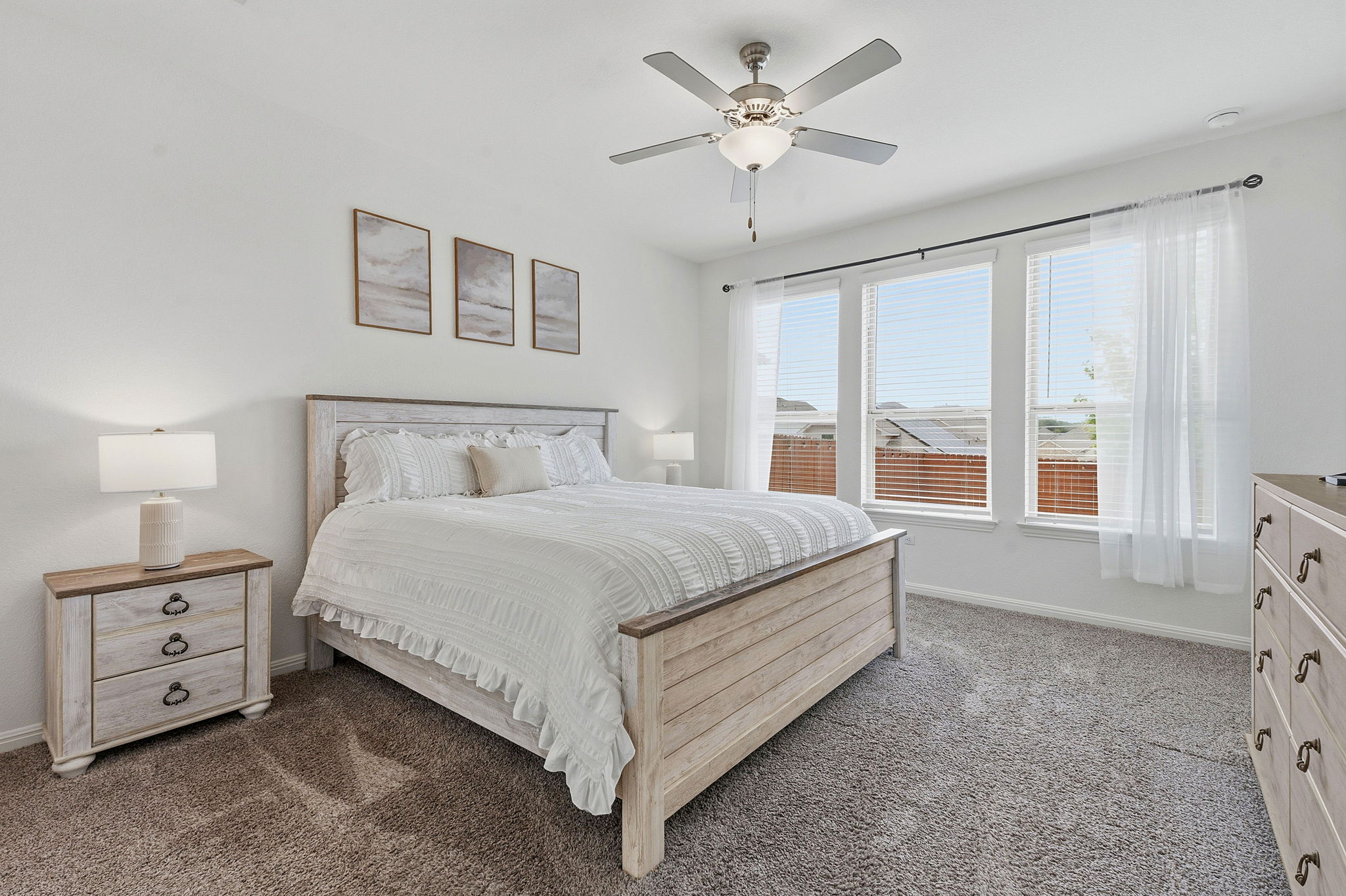 609 Allende Bend, Unit 130 Austin, TX 78748 - Photo 16 of 33 a bedroom with a large bed and a window